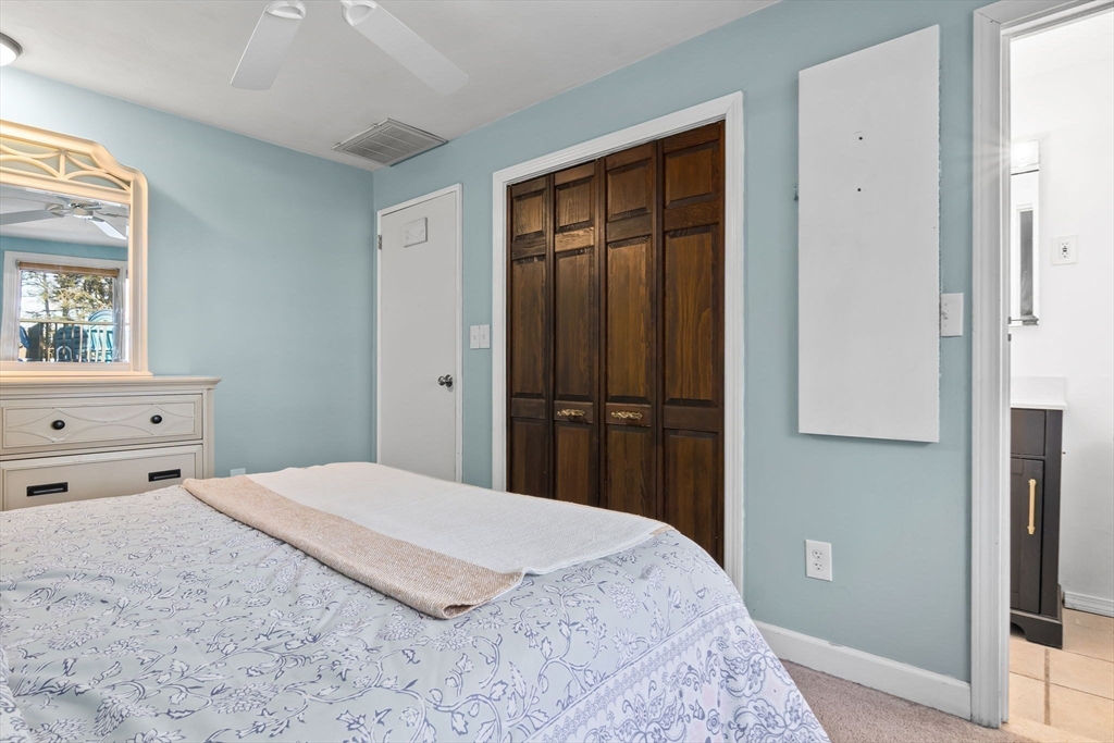 43 Colgate Road Beverly, MA 01915 - Photo 18 of 27 a bedroom with a bed and a window