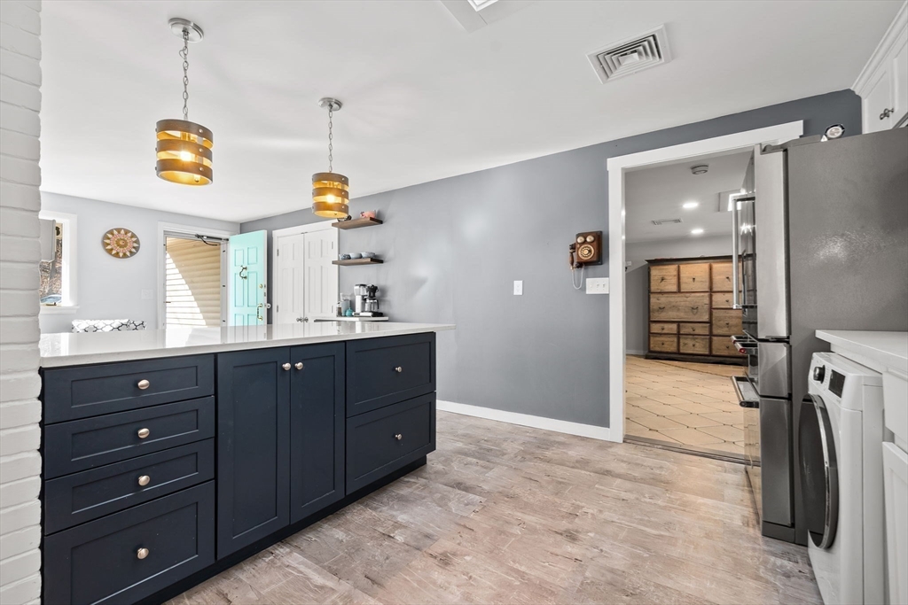 43 Colgate Road Beverly, MA 01915 - Photo 7 of 27 a bathroom with a sink a vanity and a window