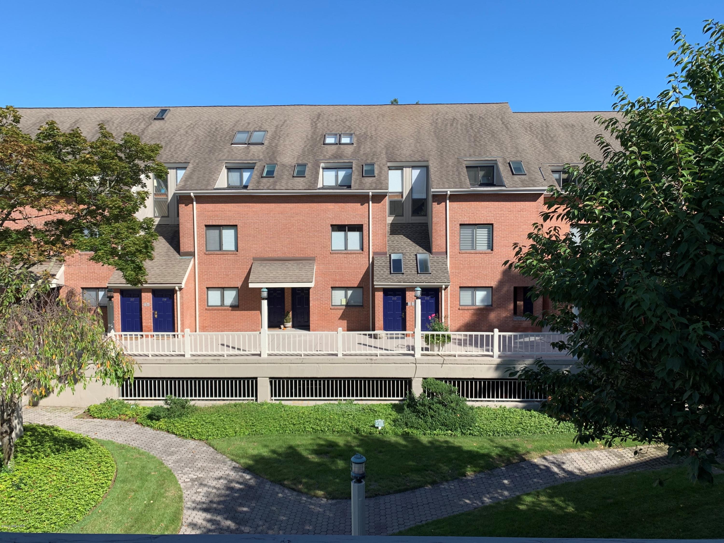 aerial view of a house with a yard