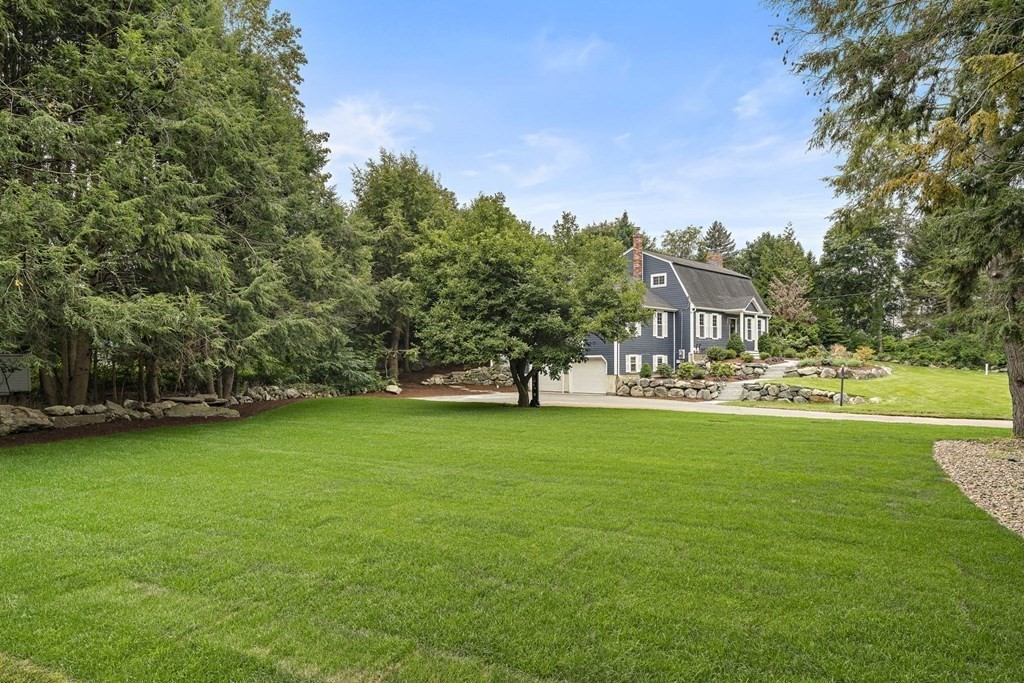 8 Longmeadow Road Weston, MA 02493 - Photo 2 of 39 a view of a house with a big yard