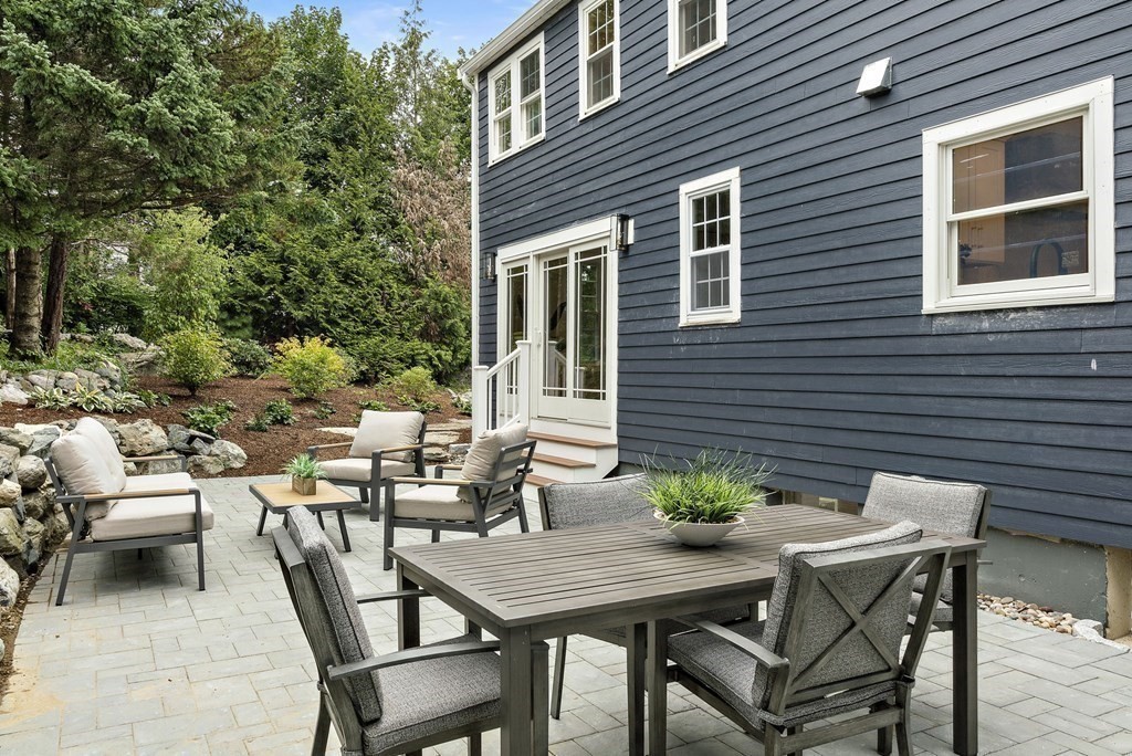 8 Longmeadow Road Weston, MA 02493 - Photo 37 of 39 a view of a outdoor seating area with furniture