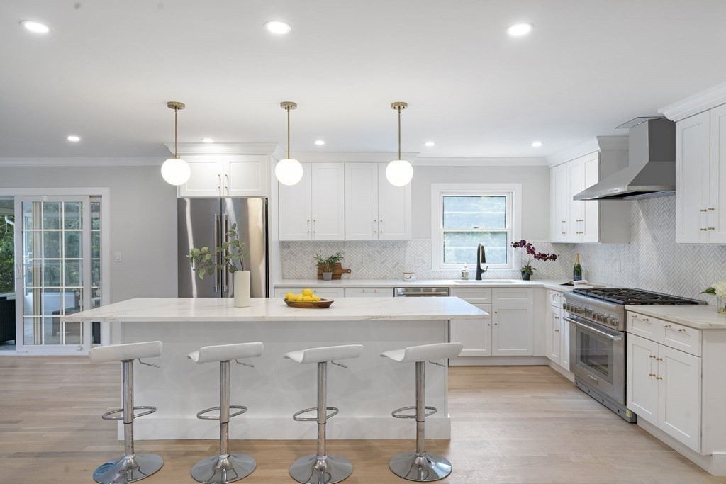 8 Longmeadow Road Weston, MA 02493 - Photo 6 of 39 a kitchen with a sink cabinets and window