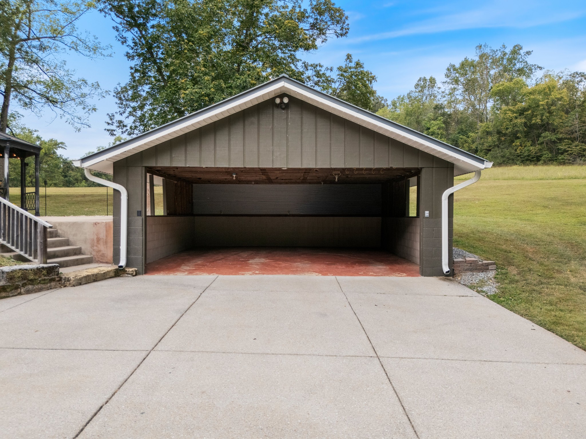 7770 Smith Road Primm Springs, TN 38476 - Photo 17 of 62 a backyard of a house with lots of green space
