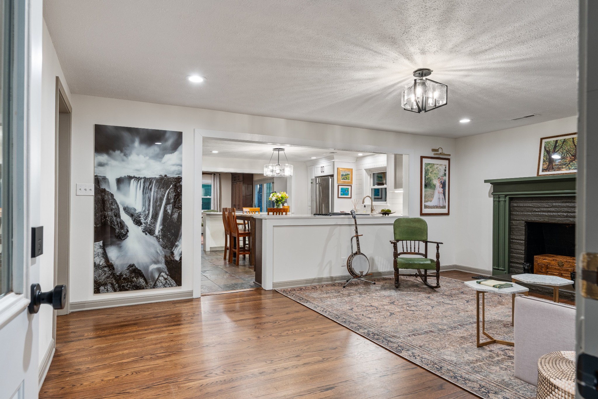 7770 Smith Road Primm Springs, TN 38476 - Photo 18 of 62 a view of a livingroom with furniture and a kitchen