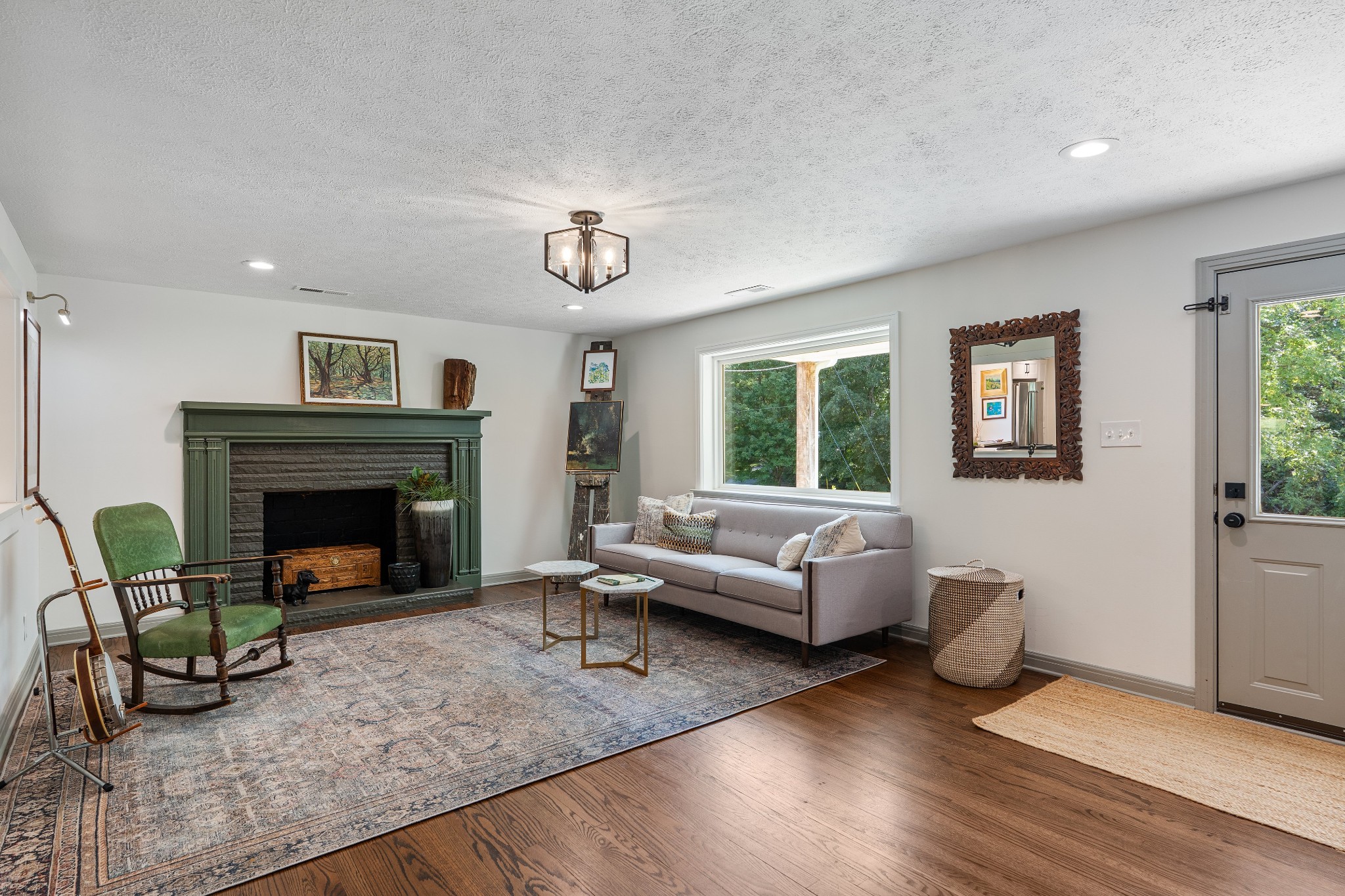 7770 Smith Road Primm Springs, TN 38476 - Photo 19 of 62 a living room with furniture and a fireplace