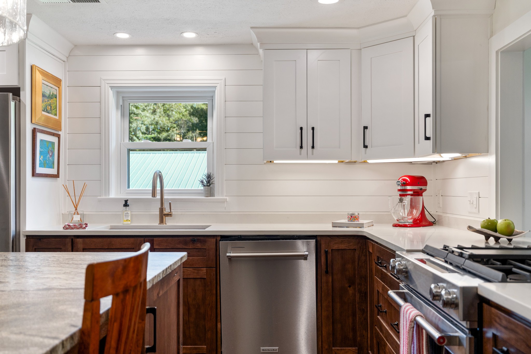 7770 Smith Road Primm Springs, TN 38476 - Photo 25 of 62 a kitchen with stainless steel appliances granite countertop a sink stove and cabinets