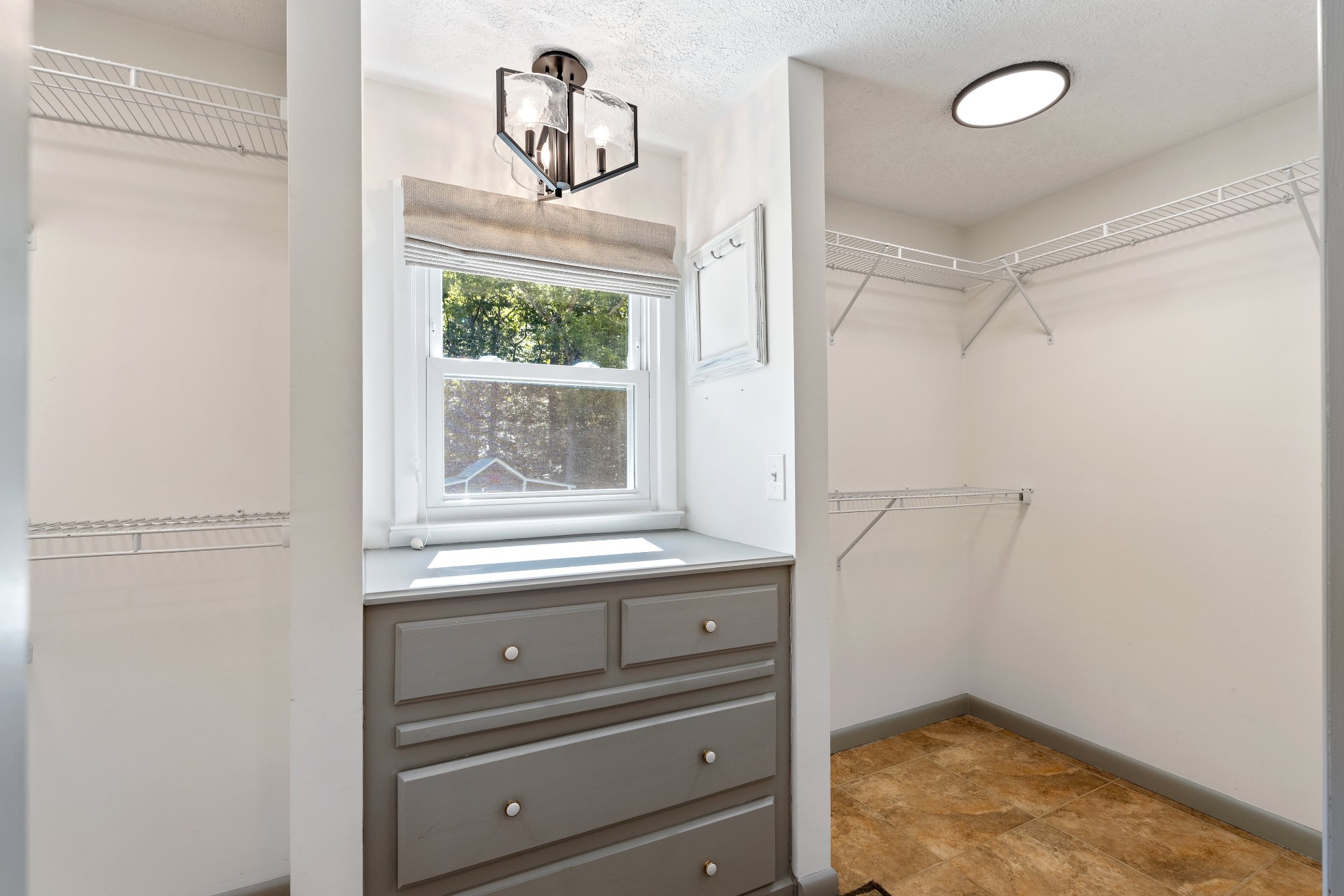 7770 Smith Road Primm Springs, TN 38476 - Photo 42 of 62 a bathroom with a window and a shower