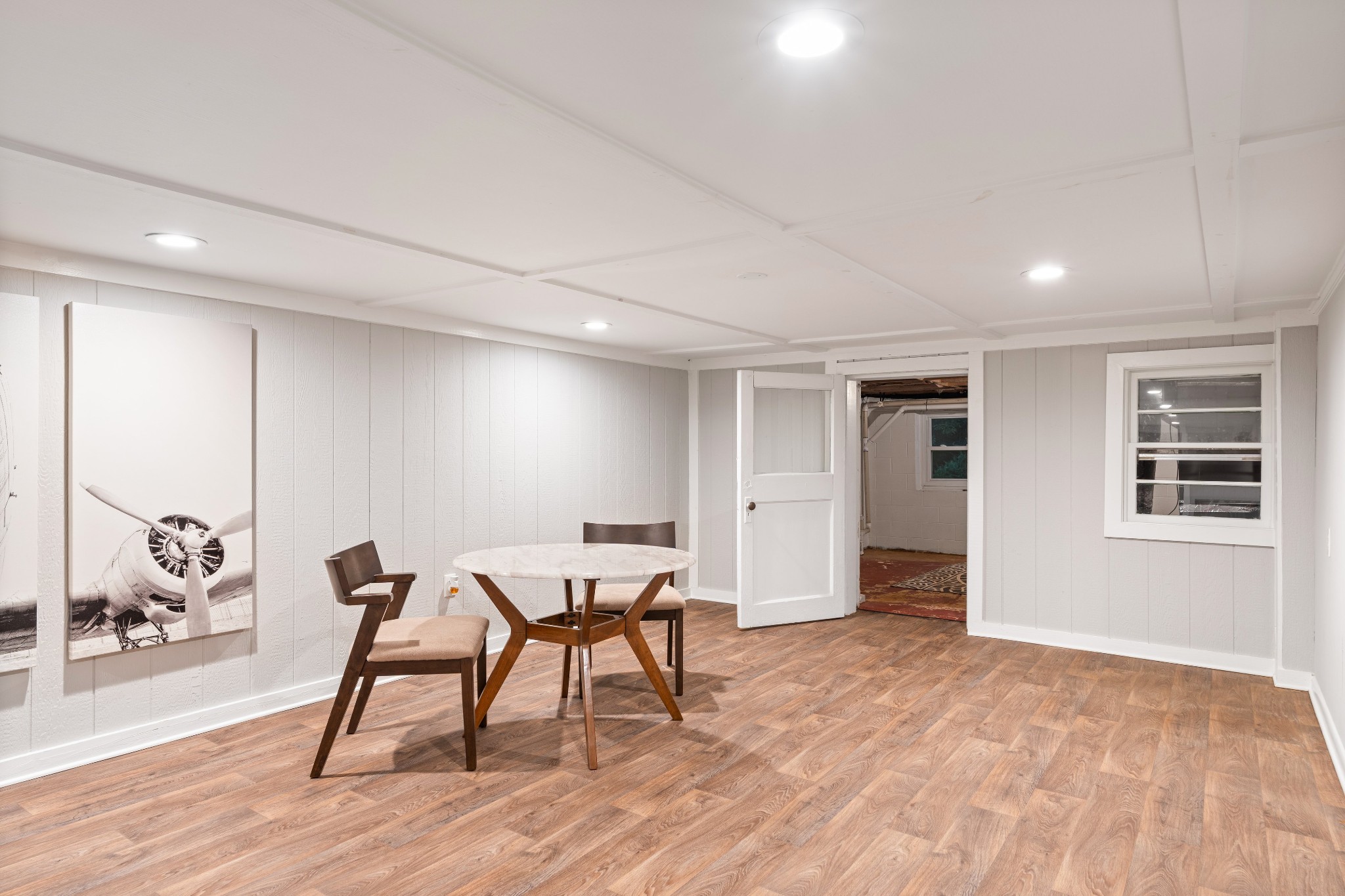 7770 Smith Road Primm Springs, TN 38476 - Photo 52 of 62 a view of a room with furniture and wooden floor