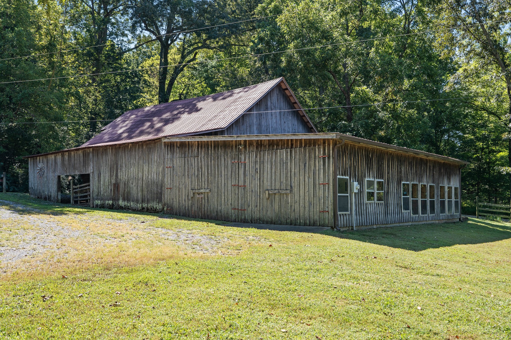 7770 Smith Road Primm Springs, TN 38476 - Photo 54 of 62 a front view of house with yard and trees in the background