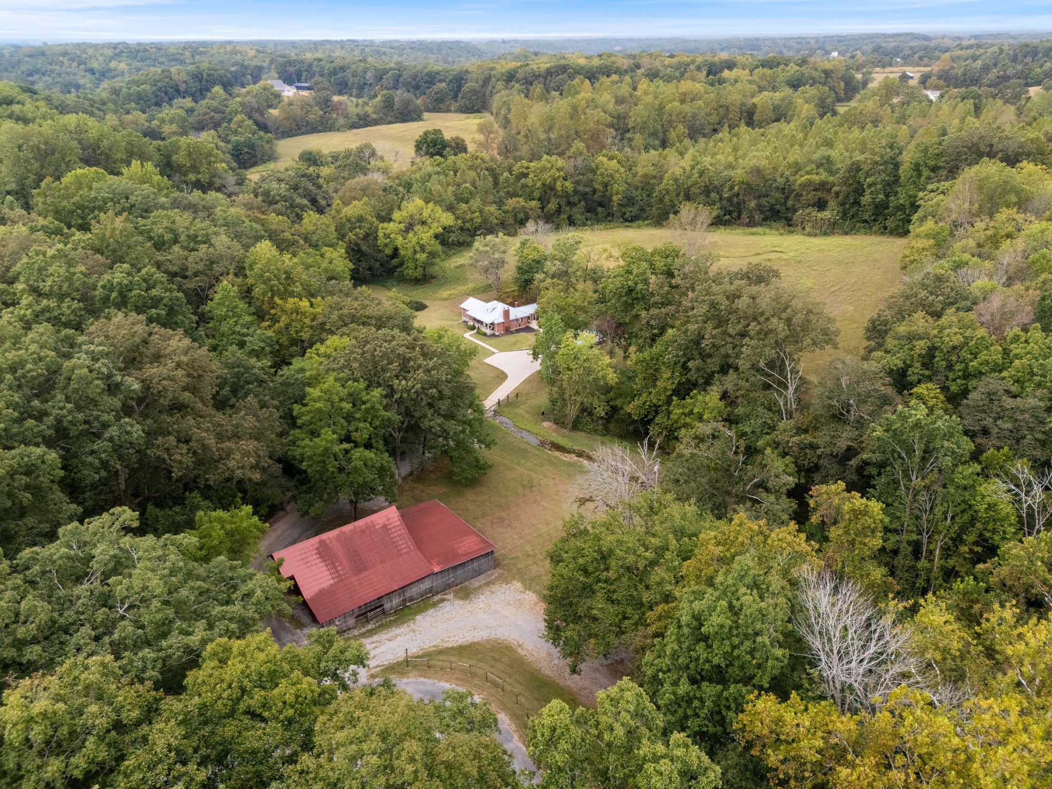 7770 Smith Road Primm Springs, TN 38476 - Photo 9 of 62 an aerial view of a house with a yard