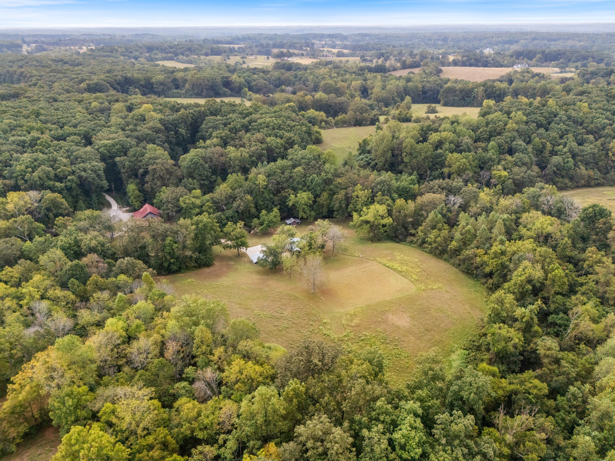 7770 Smith Road Primm Springs, TN 38476 - Photo 10 of 62 an aerial view of a houses with city view