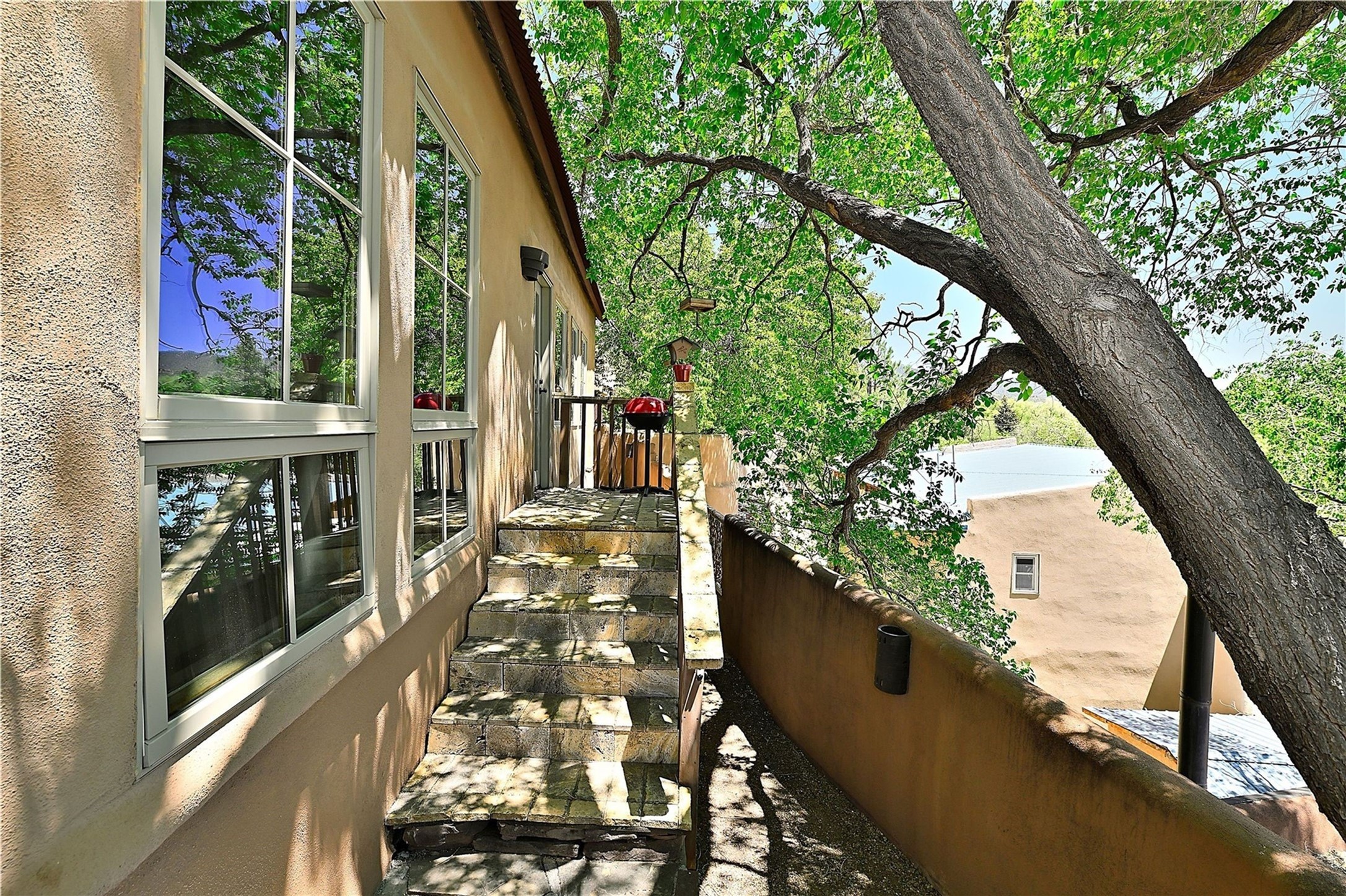 227 Rodriguez Street Santa Fe, NM 87501 - Photo 31 of 39 back walkway to patios