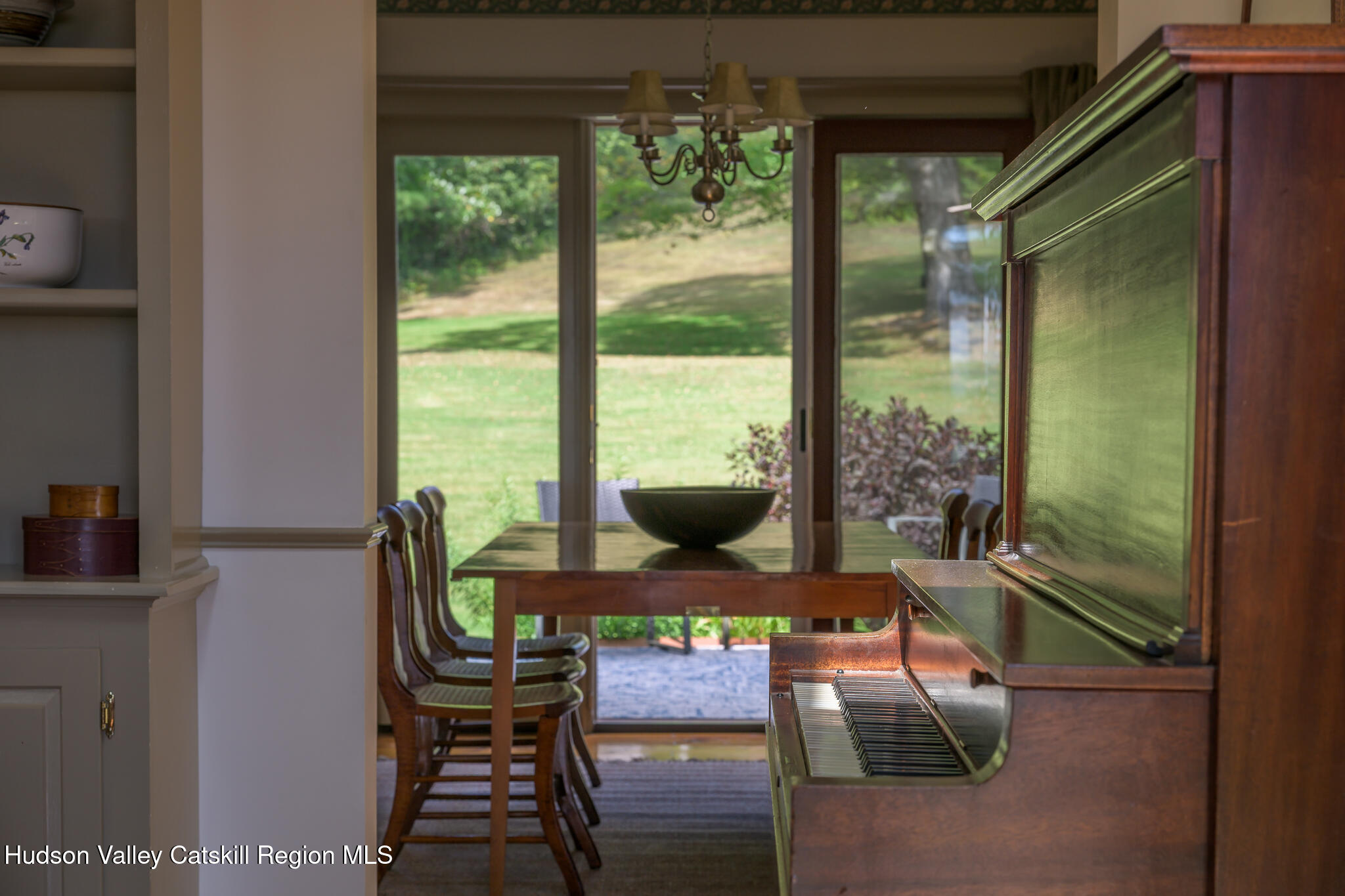 21 Stone House Road Canaan, NY 12029 - Photo 17 of 76 a view of a dining room with furniture window and outside view