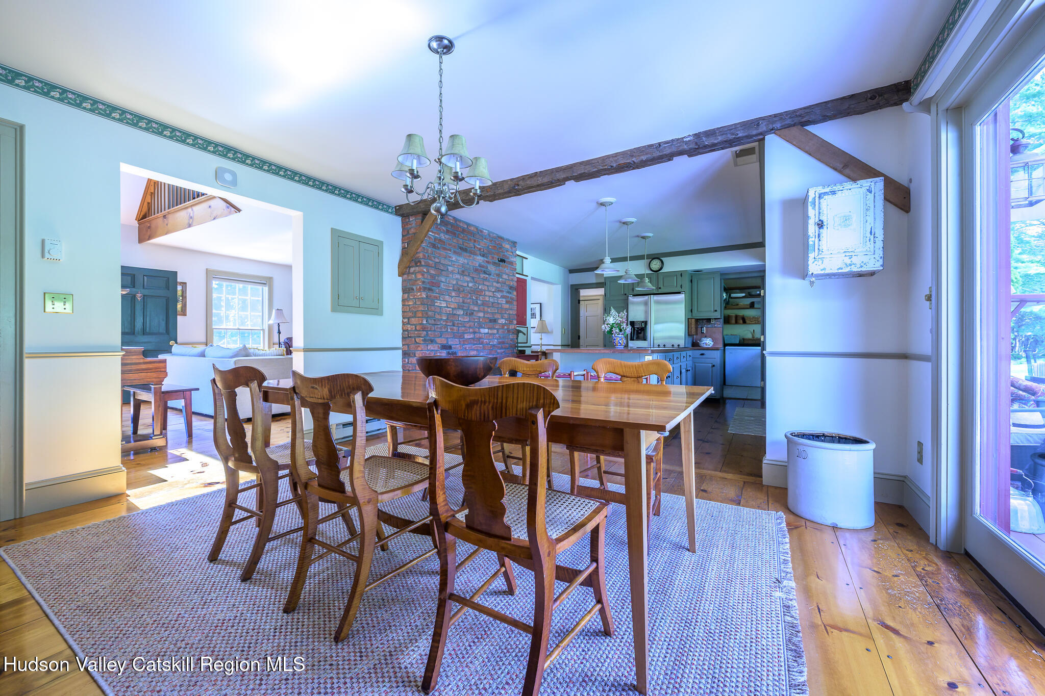21 Stone House Road Canaan, NY 12029 - Photo 19 of 76 a view of a dining room with furniture and wooden floor