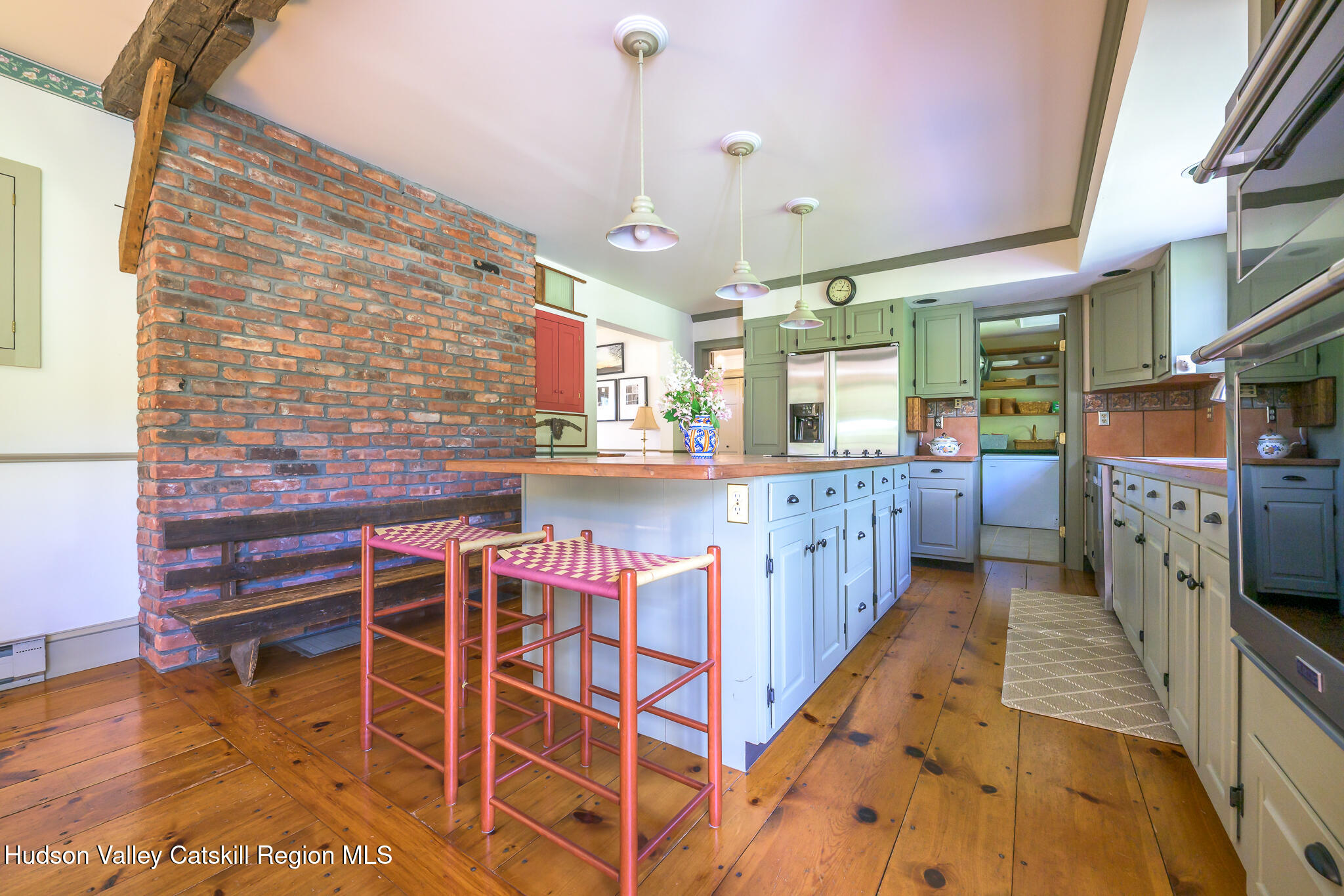 21 Stone House Road Canaan, NY 12029 - Photo 20 of 76 a kitchen with stainless steel appliances kitchen island granite countertop a stove a sink and a refrigerator