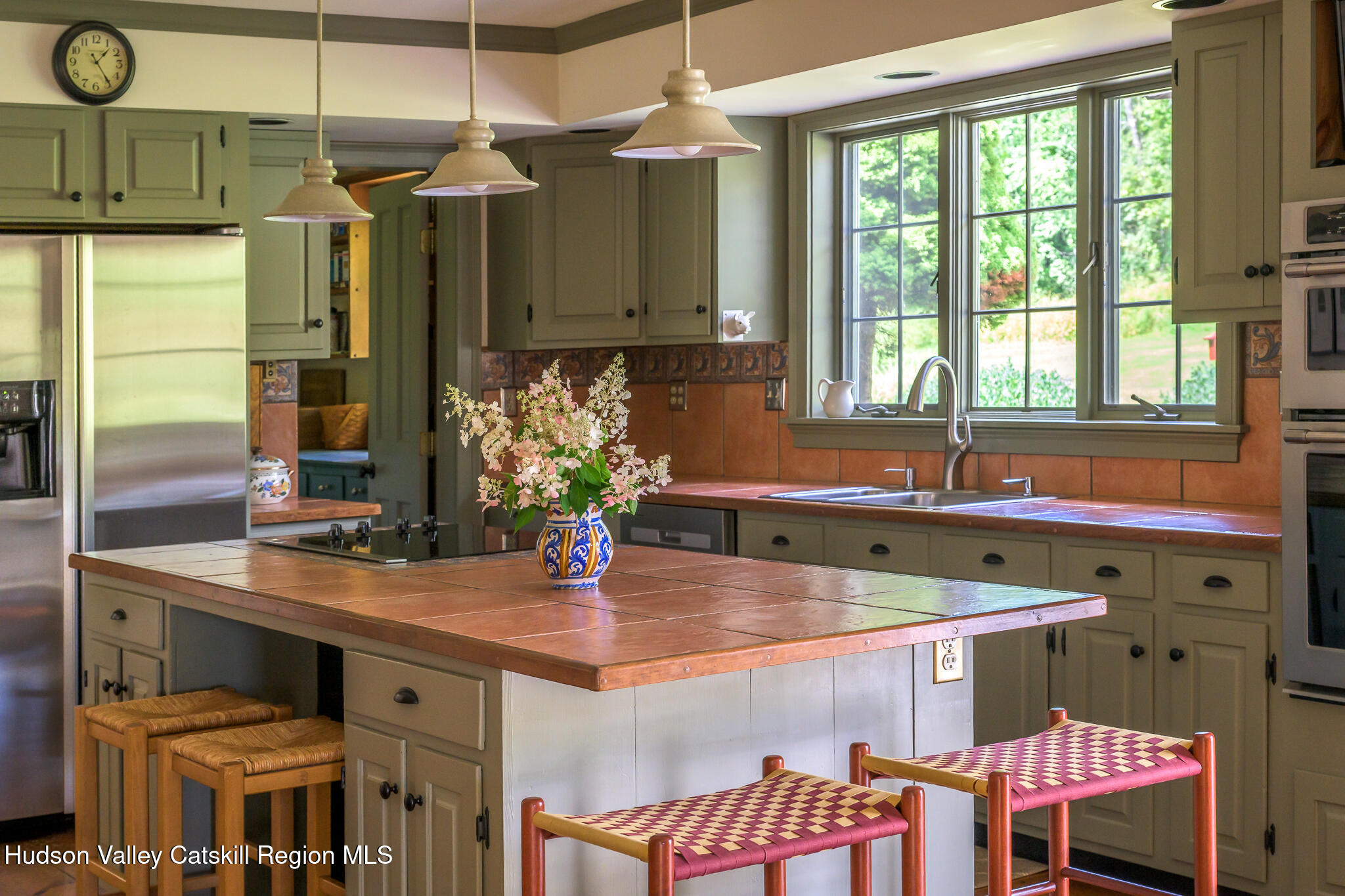 21 Stone House Road Canaan, NY 12029 - Photo 21 of 76 a kitchen with a sink and a refrigerator