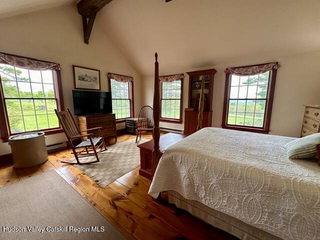 21 Stone House Road Canaan, NY 12029 - Photo 28 of 76 a bed sitting in a bedroom next to a window