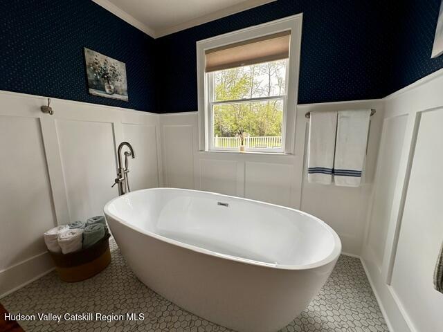 21 Stone House Road Canaan, NY 12029 - Photo 33 of 76 a white bath tub sitting in a bathroom next to a window