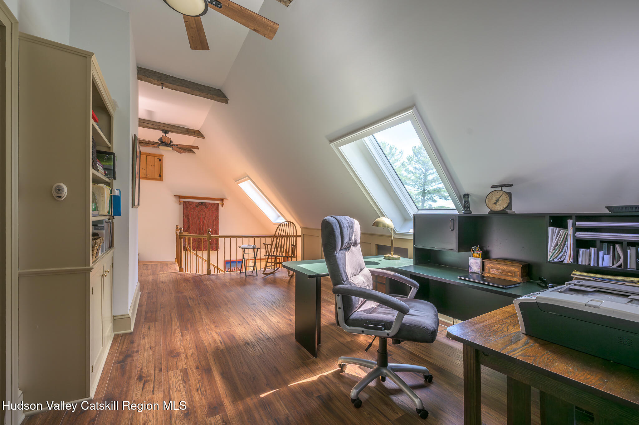 21 Stone House Road Canaan, NY 12029 - Photo 41 of 76 a workspace with furniture hardwood floor and a window