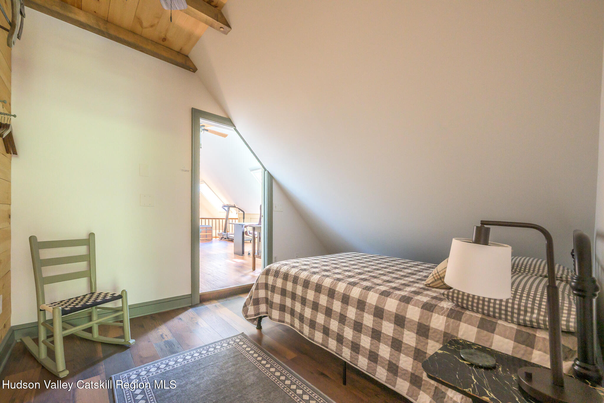21 Stone House Road Canaan, NY 12029 - Photo 43 of 76 a bedroom with a bed and chair