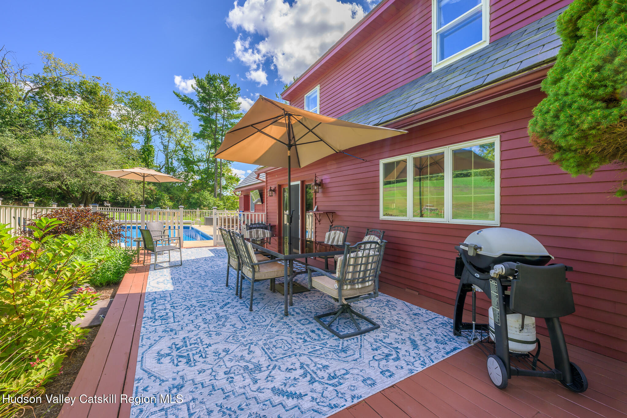 21 Stone House Road Canaan, NY 12029 - Photo 55 of 76 a view of a chairs and table in the patio