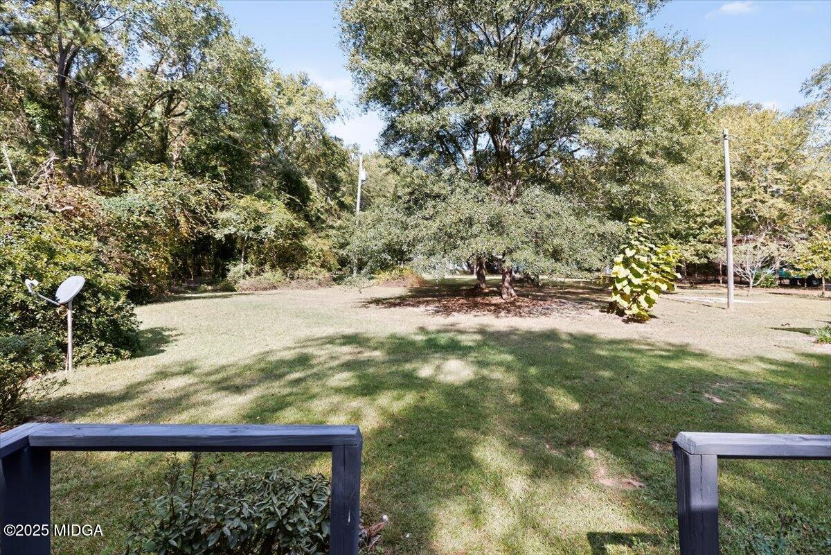 1659 Henderson Road Macon, GA 31217 - Photo 26 of 44 a view of a yard with a tree