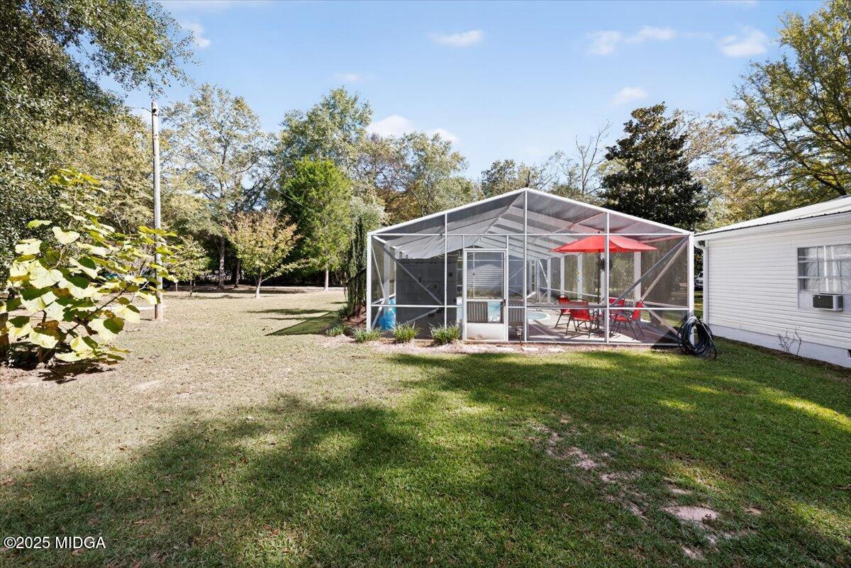 1659 Henderson Road Macon, GA 31217 - Photo 28 of 44 a view of a house with backyard and sitting area