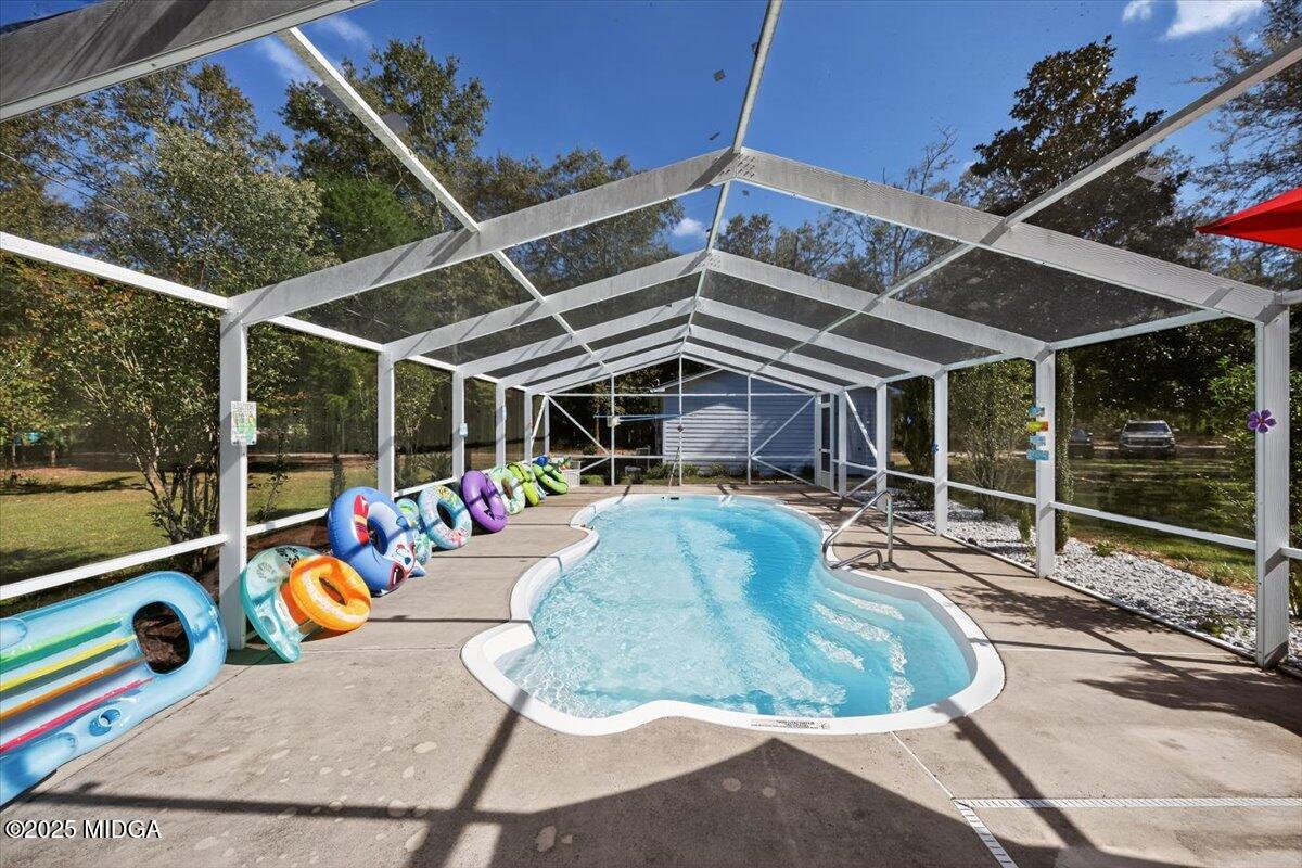 1659 Henderson Road Macon, GA 31217 - Photo 29 of 44 a view of a chairs and table in the patio