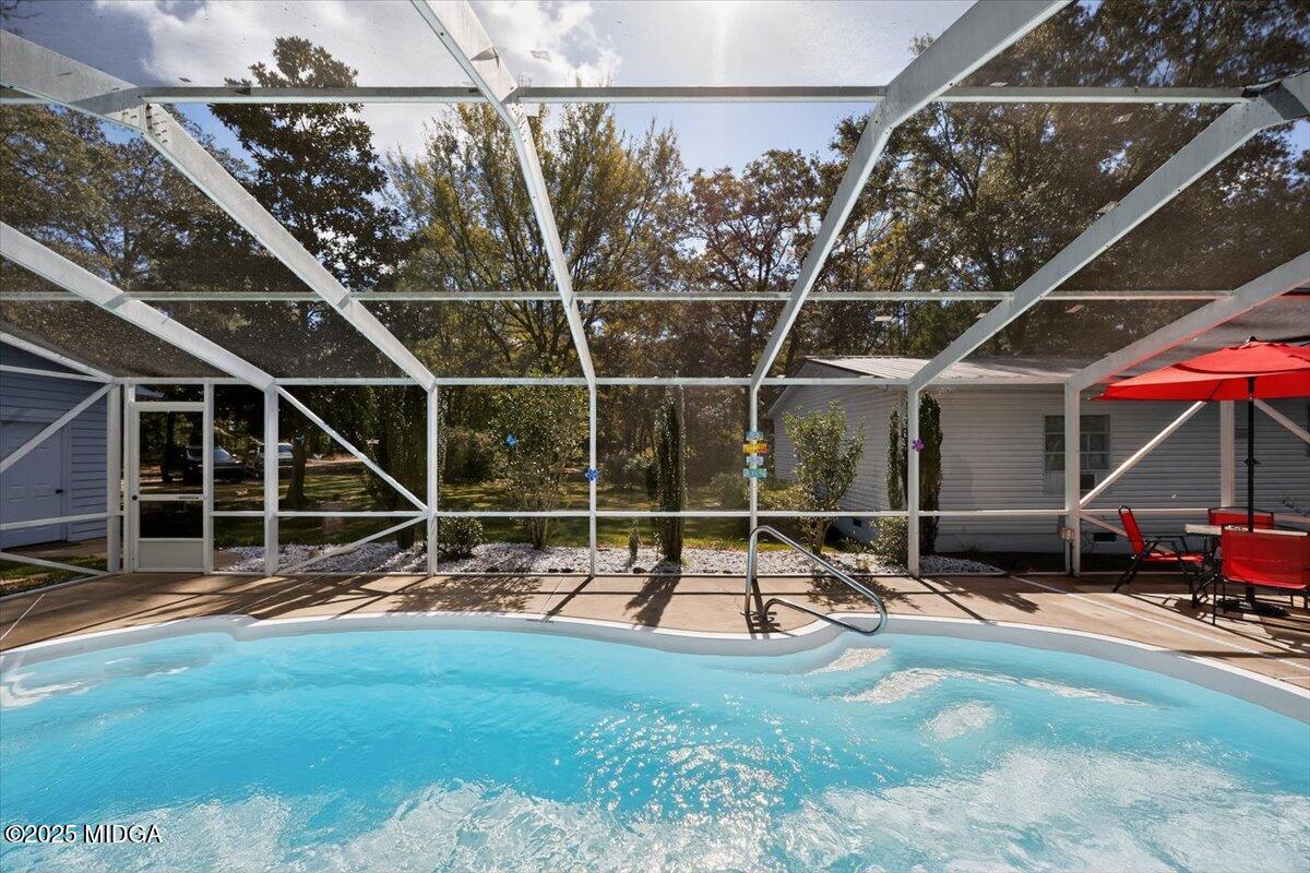 1659 Henderson Road Macon, GA 31217 - Photo 30 of 44 a view of outdoor space with wooden deck and a potted plant
