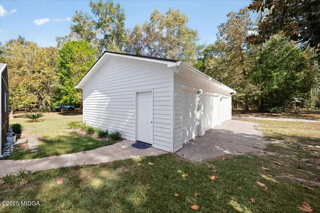 a view of backyard of house