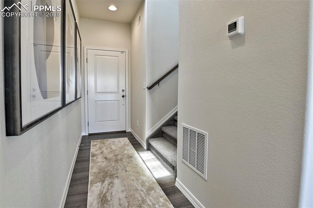 10847 Raylan Way Peyton, CO 80831 - Photo 14 of 40 a view of a hallway with entryway