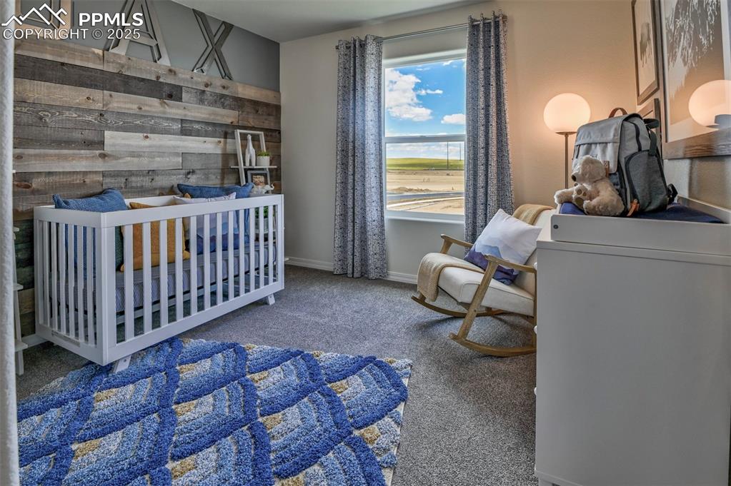 10847 Raylan Way Peyton, CO 80831 - Photo 39 of 40 a room with furniture