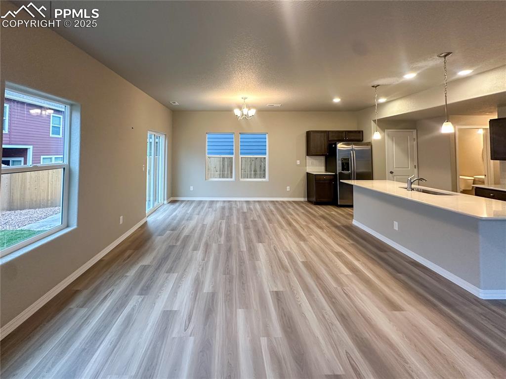 10847 Raylan Way Peyton, CO 80831 - Photo 4 of 40 a view of kitchen with sink and refrigerator