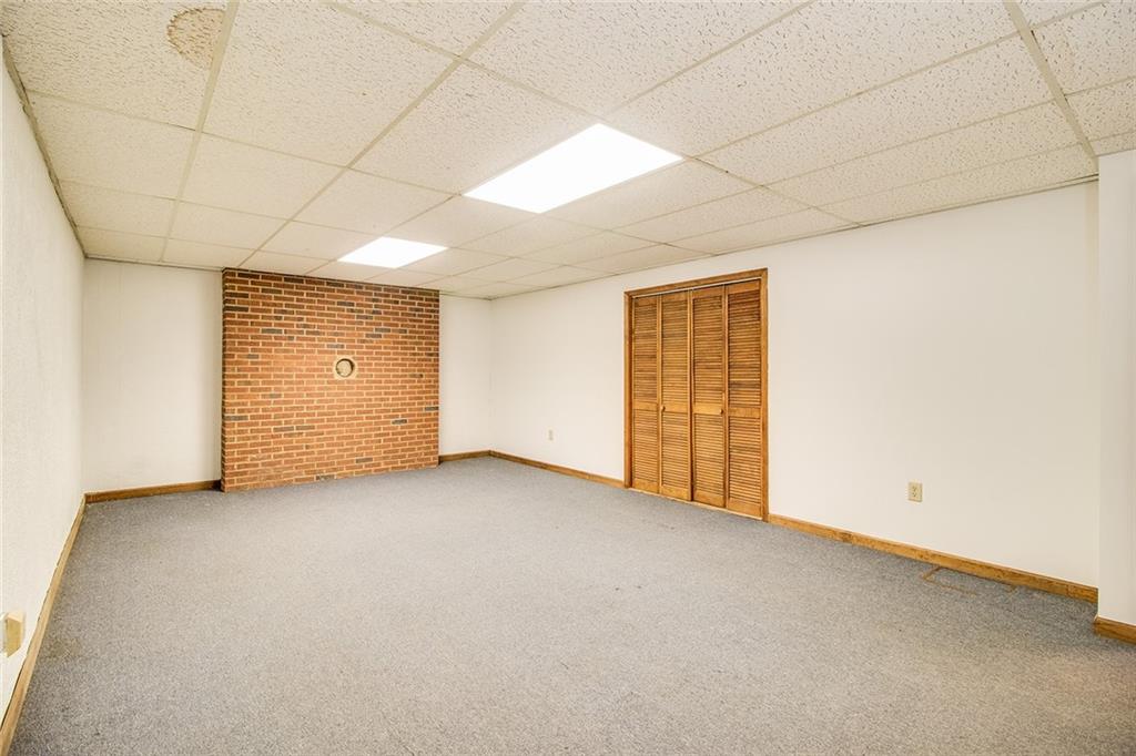 3925 Mark Lake Road Cumming, GA 30028 - Photo 40 of 59 an empty room with closet