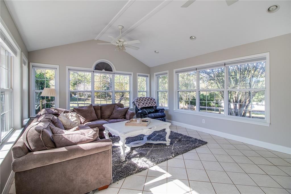 3925 Mark Lake Road Cumming, GA 30028 - Photo 45 of 59 a living room with furniture and a large window