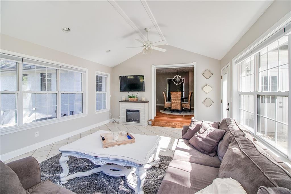 3925 Mark Lake Road Cumming, GA 30028 - Photo 48 of 59 a living room with furniture and a flat screen tv