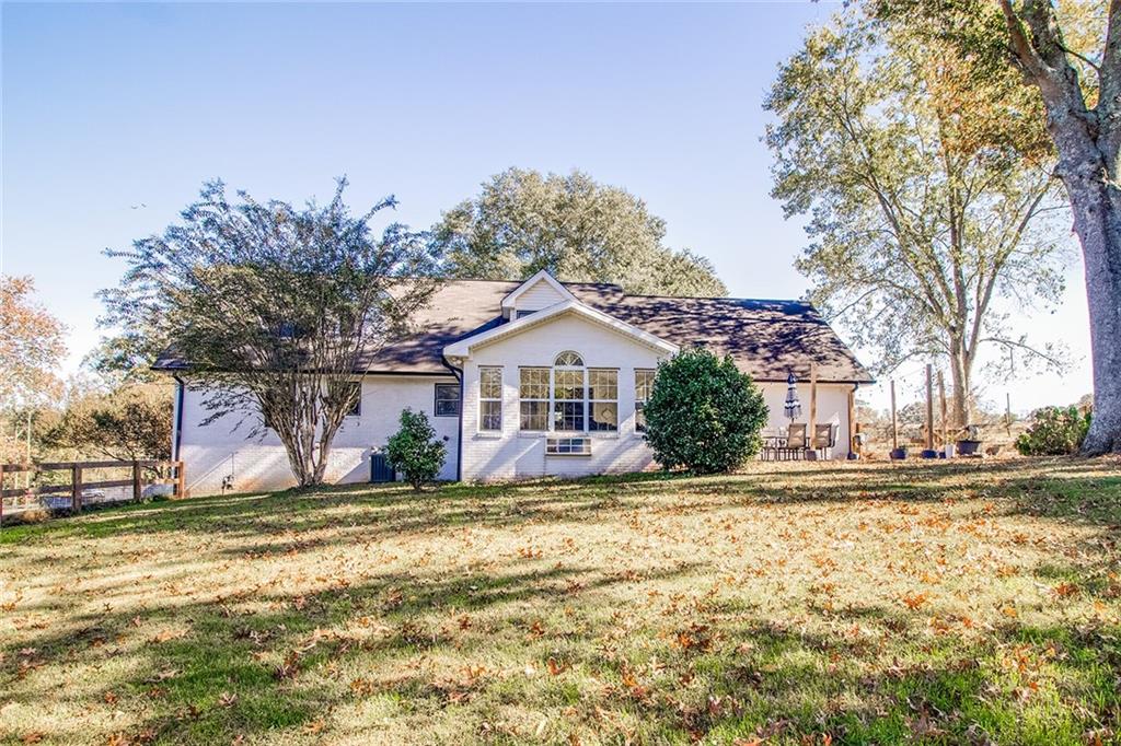 3925 Mark Lake Road Cumming, GA 30028 - Photo 54 of 59 a house view with a outdoor space