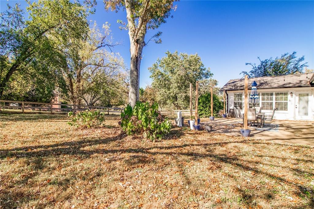 3925 Mark Lake Road Cumming, GA 30028 - Photo 57 of 59 a view of a house with a yard and sitting area