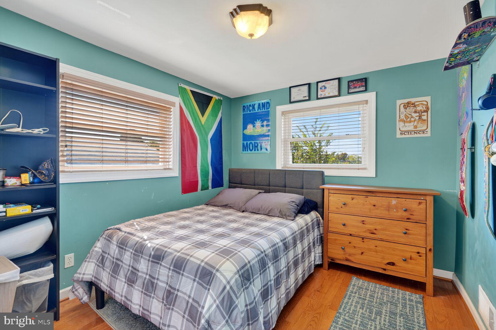 260 45th Street Northeast Washington, DC 20019 - Photo 11 of 19 Cozy bedroom with vibrant decor.