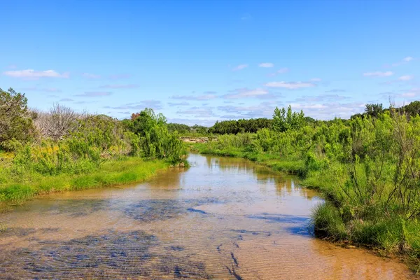 a view of a lake with houses