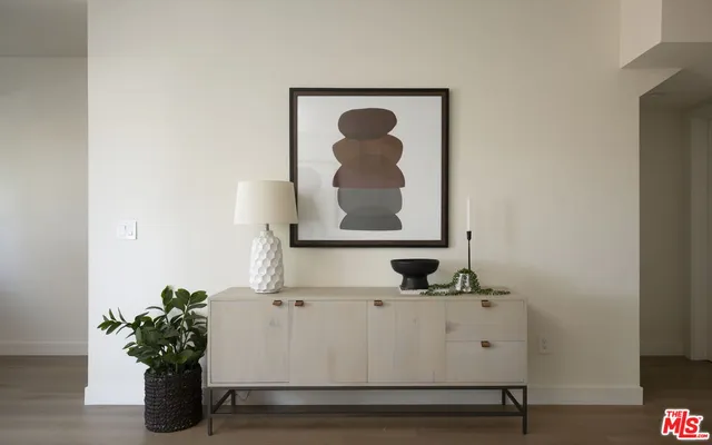 a vase of flowers sitting on a table