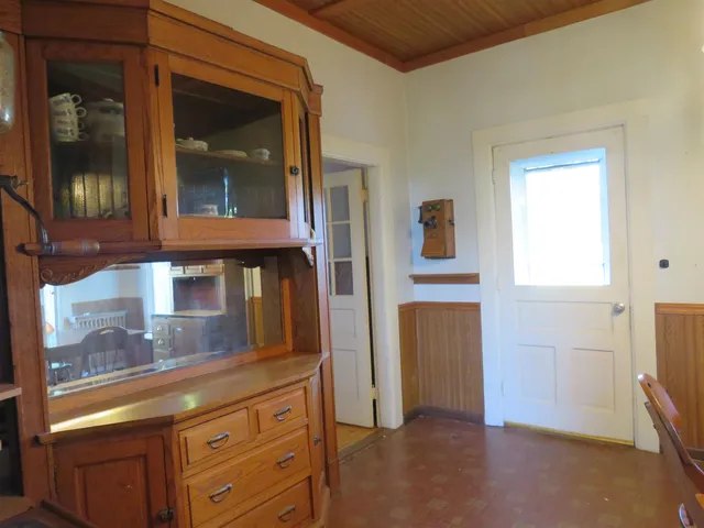 a kitchen with a sink stove and microwave