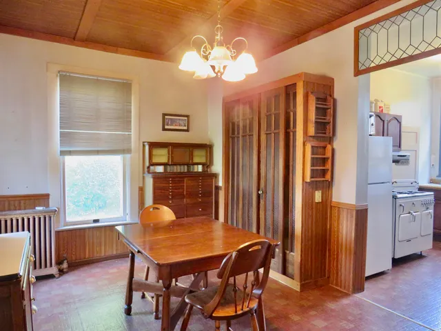 a view of a lake with houses in all around