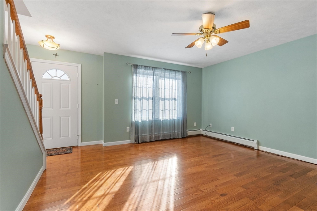 210 Bean Porridge Hill Road Westminster, MA 01473 - Photo 17 of 39 wooden floor in an empty room with a window