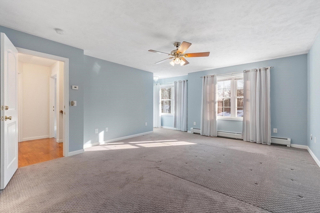 210 Bean Porridge Hill Road Westminster, MA 01473 - Photo 22 of 39 a view of an empty room with a window