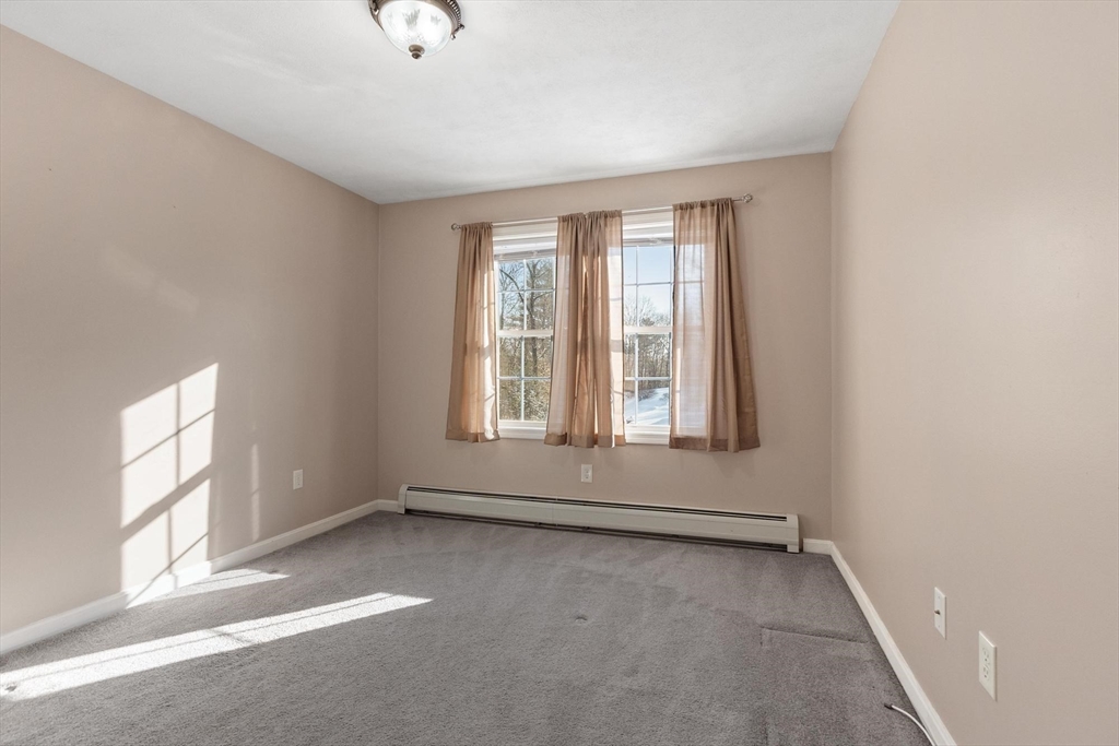 210 Bean Porridge Hill Road Westminster, MA 01473 - Photo 27 of 39 an empty room with windows