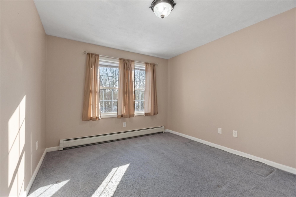 210 Bean Porridge Hill Road Westminster, MA 01473 - Photo 29 of 39 an empty room with a window