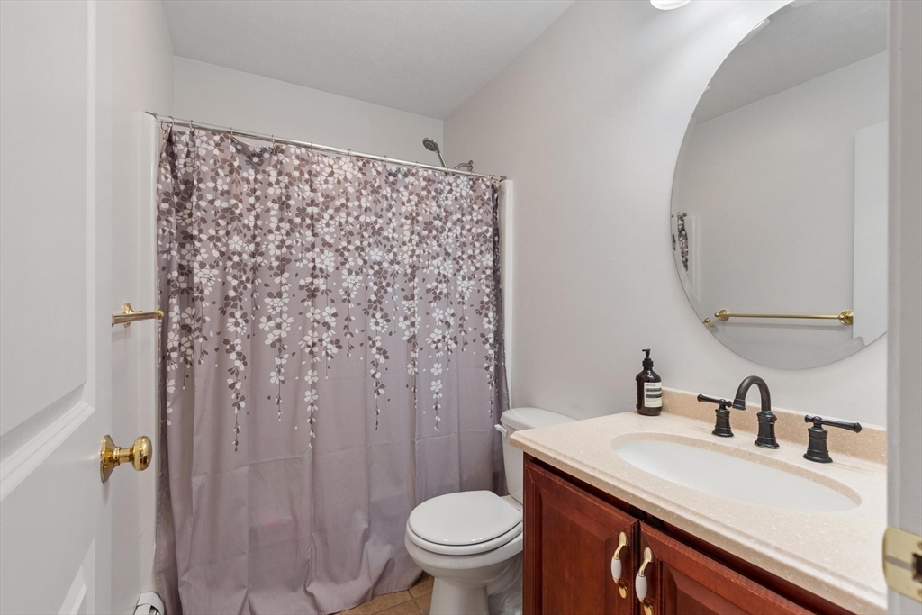 210 Bean Porridge Hill Road Westminster, MA 01473 - Photo 33 of 39 a bathroom with a sink toilet and shower