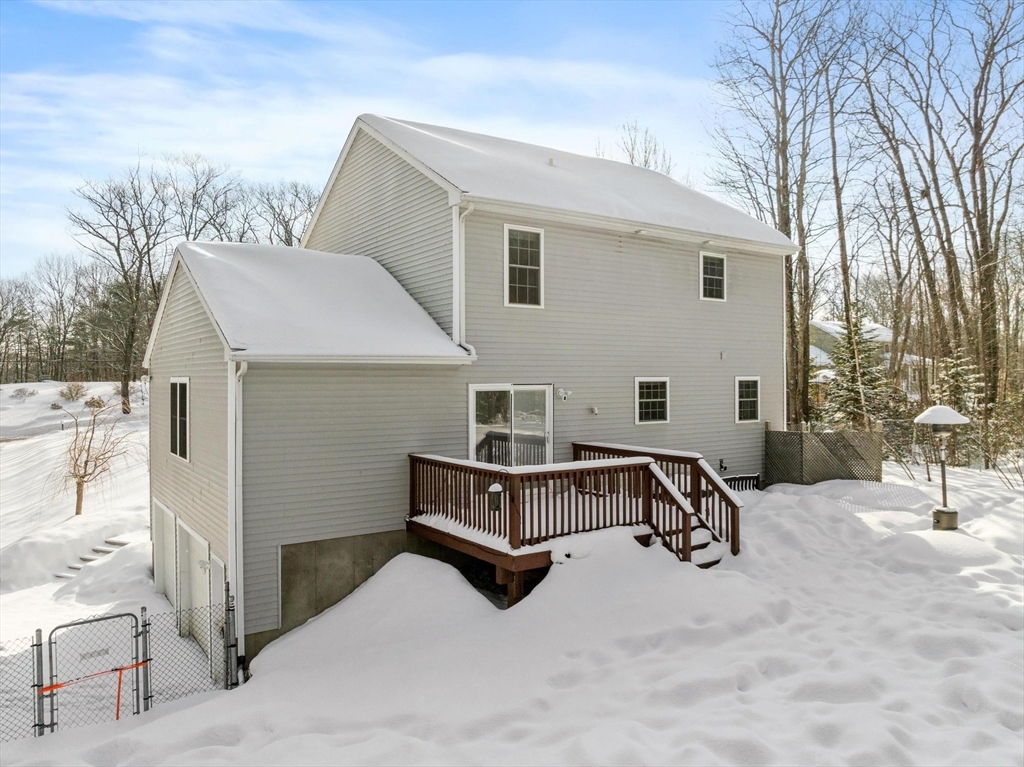 210 Bean Porridge Hill Road Westminster, MA 01473 - Photo 37 of 39 a view of a white house with a yard and sitting area
