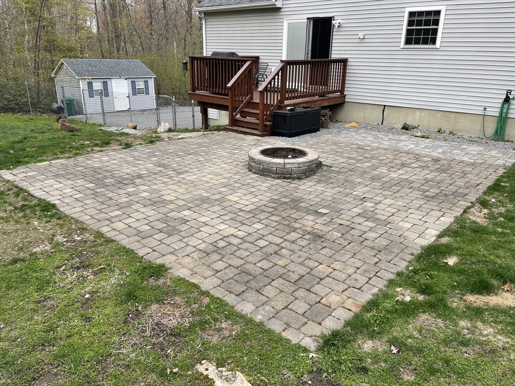 210 Bean Porridge Hill Road Westminster, MA 01473 - Photo 38 of 39 a backyard of a house with wooden fence